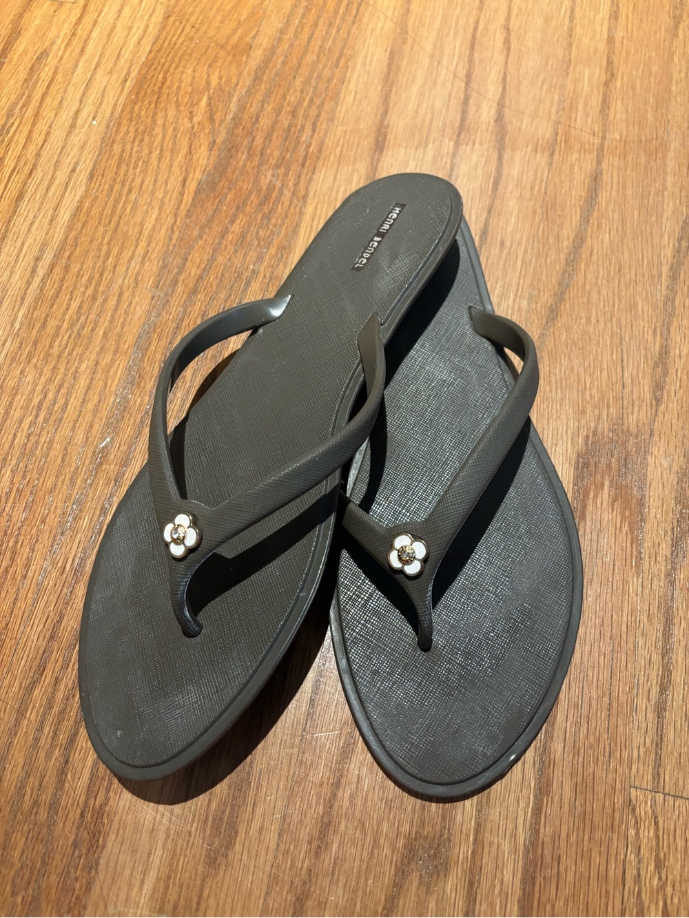 Henri Bendel Women's Flip Flop Sandals with Gold Floral Accent